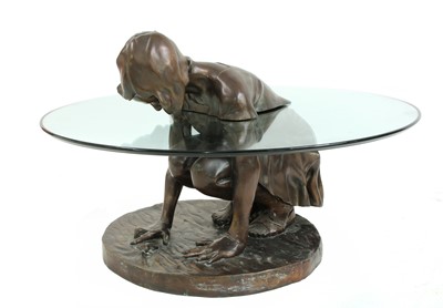 Lot 594 - A contemporary bronze and glass 'She'll Find' coffee table