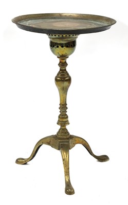 Lot 111 - A George II brass kettle stand