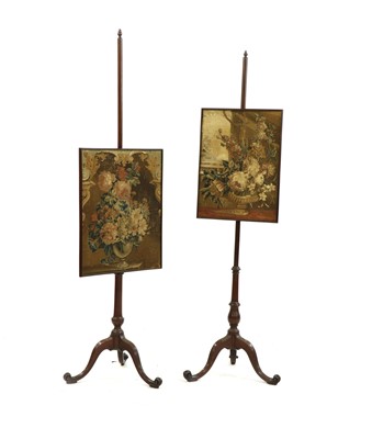 Lot 340 - A near  pair of George III mahogany pole screens