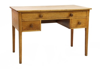 Lot 103 - An oak desk