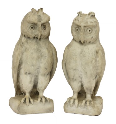 Lot 324 - A pair of carved marble owls