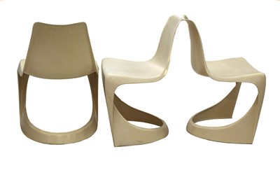 Lot 527 - Three Cado moulded plastic stacking chairs
