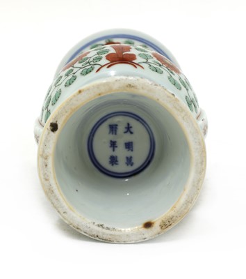 Lot 48 - A Chinese polychrome-decorated gu vase