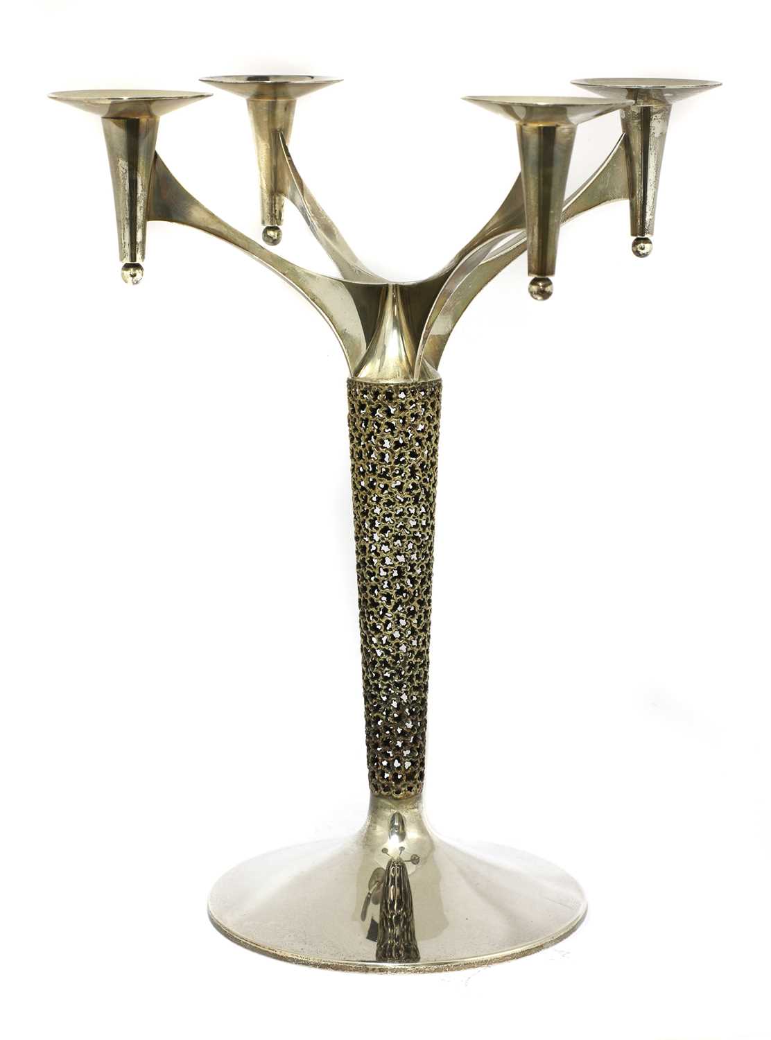 Lot 409 - A silver-gilt four branch candelabra