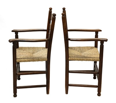 Lot 97 - A pair of rare Gordon Russell yew wood ladderback chairs