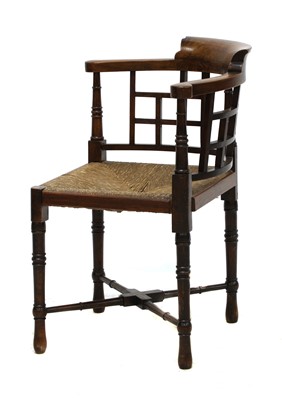 Lot 18 - A walnut corner chair
