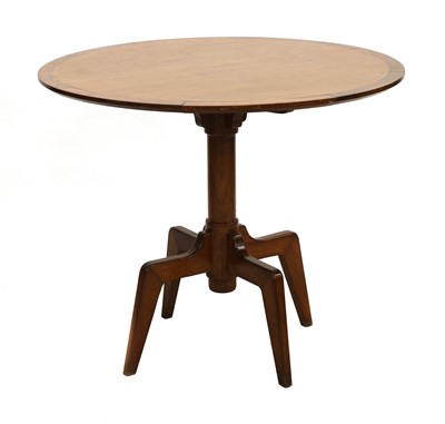Lot 286 - A teak and yew wood centre table