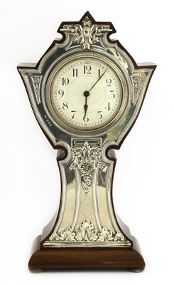 Lot 3 - An Art Nouveau silver-mounted mantel clock