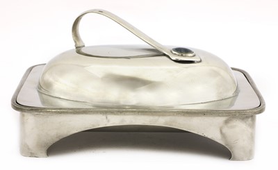 Lot 60 - An Arts and Crafts pewter muffin dish and cover
