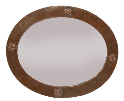 Lot 42 - A Liberty oval copper wall mirror