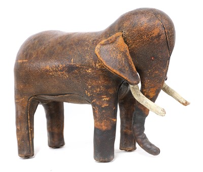 Lot 554 - A leather elephant footstool