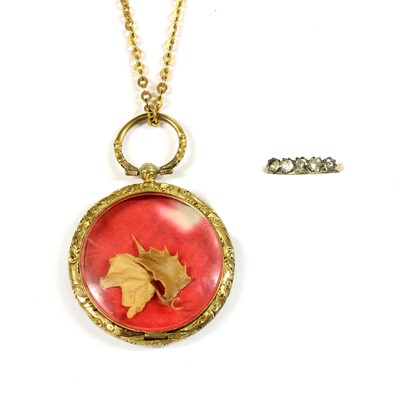 Lot 22 - A gilt metal photo locket