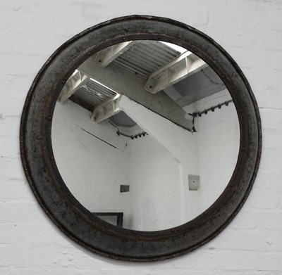 Lot 464 - An industrial metal circular mirror