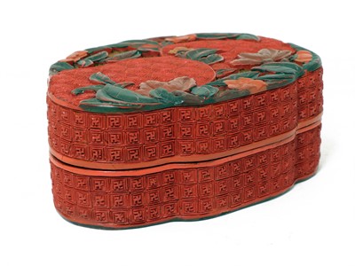 Lot 143 - A Chinese cinnabar lacquered box and cover