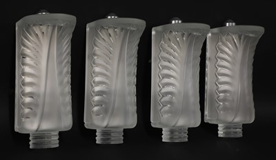 Lot 217 - A set of four Lalique 'Palme' glass wall lights