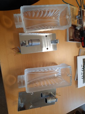 Lot 217 - A set of four Lalique 'Palme' glass wall lights