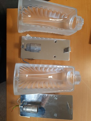 Lot 217 - A set of four Lalique 'Palme' glass wall lights