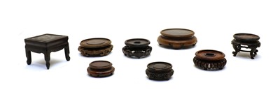 Lot 161 - A collection of Chinese wood stands