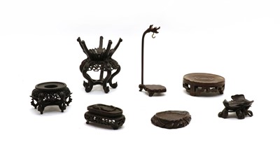 Lot 37 - Seven Chinese wooden stands