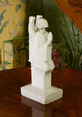 Lot 44 - A plaster figure of a kneeling angel