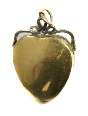 Lot 23 - A gold and silver, ruby, split pearl, diamond and enamel heart pendant