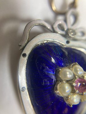Lot 23 - A gold and silver, ruby, split pearl, diamond and enamel heart pendant