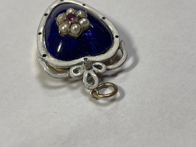 Lot 23 - A gold and silver, ruby, split pearl, diamond and enamel heart pendant