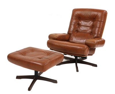 Lot 531 - A Swedish leather lounge chair and ottoman