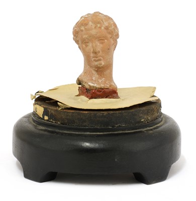 Lot 361 - A Greek terracotta head of Apollo