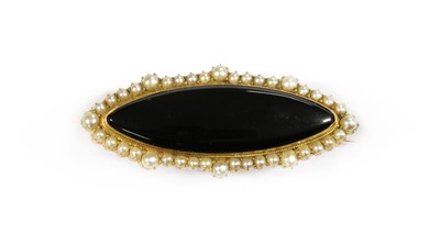 Lot 5 - A Victorian gold onyx and split pearl brooch
