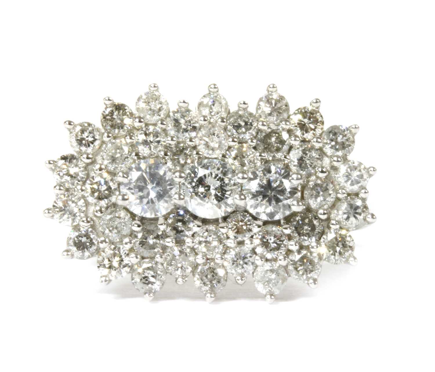 Lot 84 - A white gold diamond cluster ring