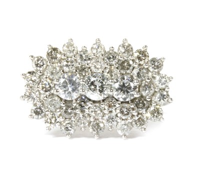 Lot 84 - A white gold diamond cluster ring