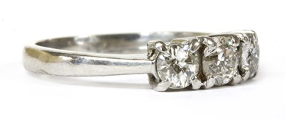 Lot 81 - A 9ct white gold three stone diamond ring