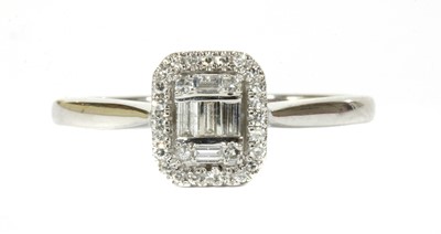Lot 97 - A white gold diamond cluster ring