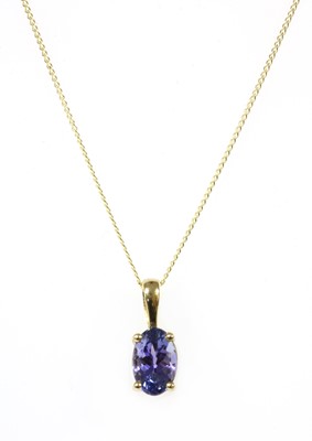 Lot 165 - A gold single stone tanzanite pendant