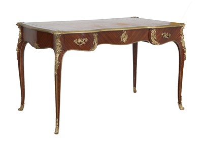 Lot 15 - A French Louis XV-style kingwood and ormolu mounted bureau plat