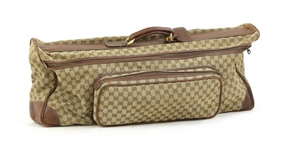 Lot 261 - A Gucci canvas leather tennis bag