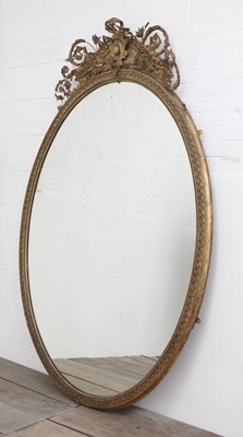Lot 57 - A large gilt overmantel mirror