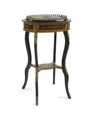 Lot 269 - A late Victorian bronzed and inlaid jardiniere stand with cover