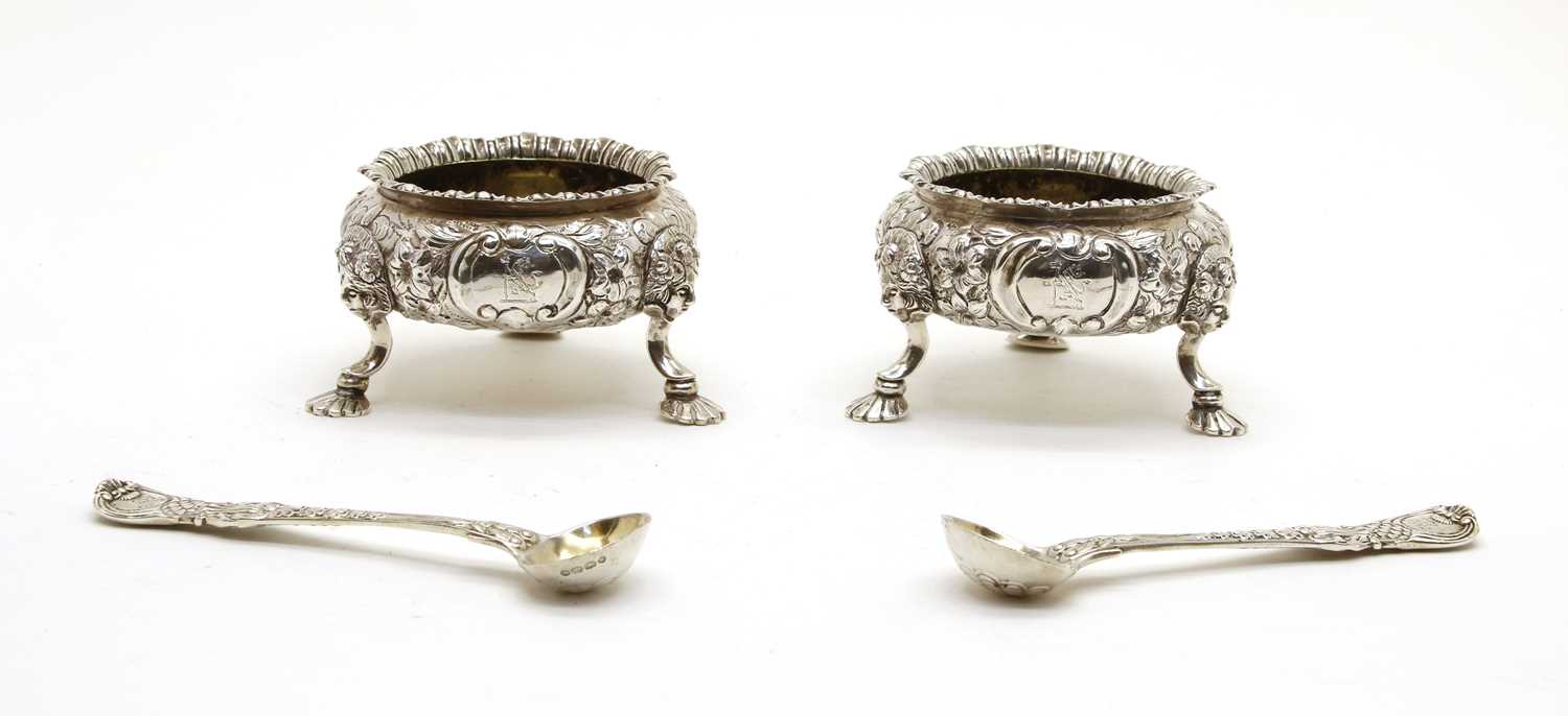 Lot 18 - A pair of Victorian silver open salts with spoons