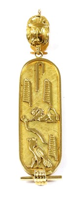 Lot 72 - A gold Egyptian cartouche pendant