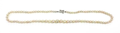 Lot 143 - A single row graduated natural saltwater pearl necklace