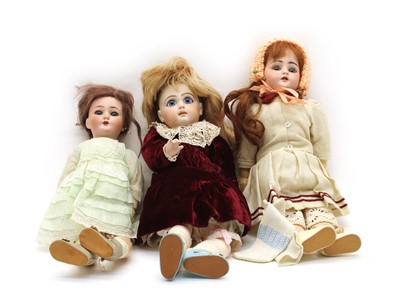 Lot 219 - Two bisque head dolls