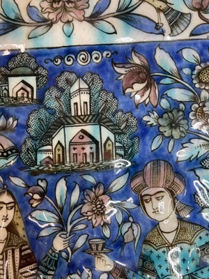 Lot 947 - A near pair of Qajar pottery tiles