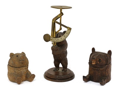 Lot 68 - A carved wooden Black Forest postal scale