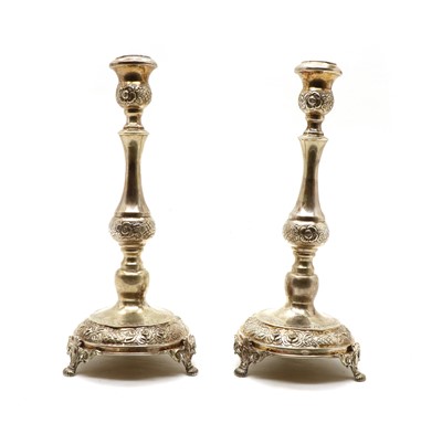 Lot 35 - A pair of Continental silver candlesticks
