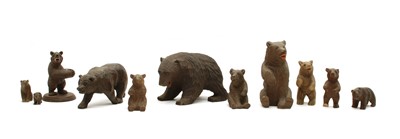 Lot 67 - A collection of ten small Black Forest and other carved wooden bears
