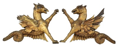 Lot 369 - An opposing pair of carved giltwood dragon finials