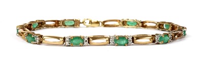 Lot 144 - A 9ct gold emerald and diamond bracelet