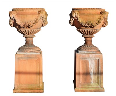 Lot 383 - A pair of terracotta garden urns